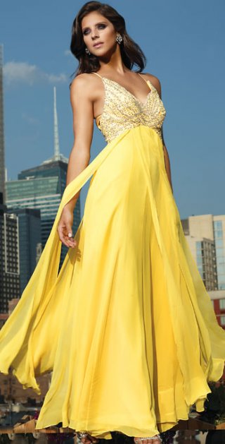 A Spaghetti Straps Beading V Neckline With A Ball Gown Formal Evening Skirt