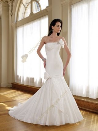 White mermaid strapless jeweled loop bow taffeta bridal gown